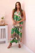 Benny Boutique макси рокля без ръкави с V‑образно деколте и икат принт в зелено, кафяво и бяло. Изработена от памучна материя.