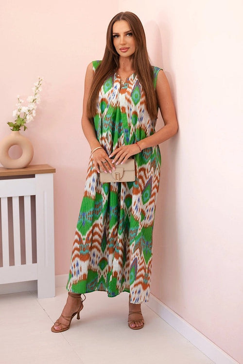 Benny Boutique макси рокля без ръкави с V‑образно деколте и икат принт в зелено, кафяво и бяло. Изработена от памучна материя.
