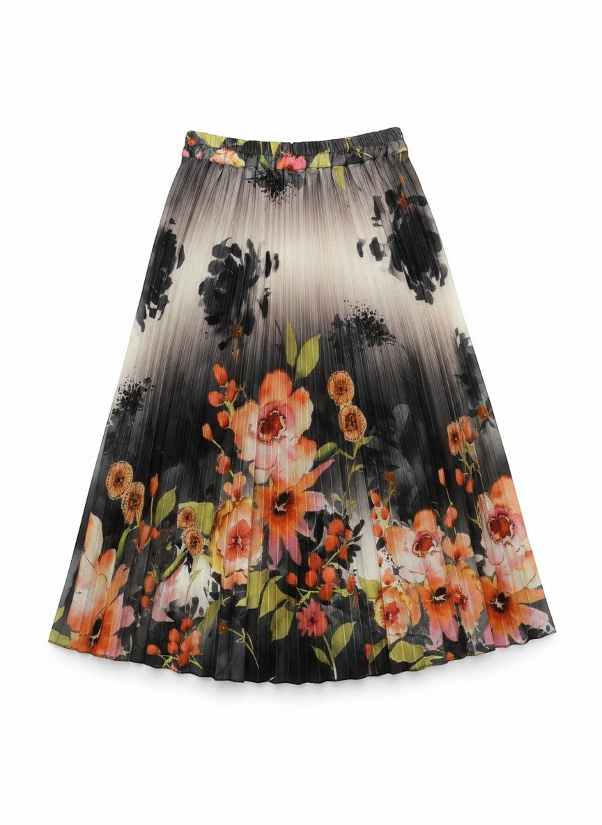 Benny Boutique pleated midi skirt with a dark background and large coral, peach, and green floral print. Elastic waist.